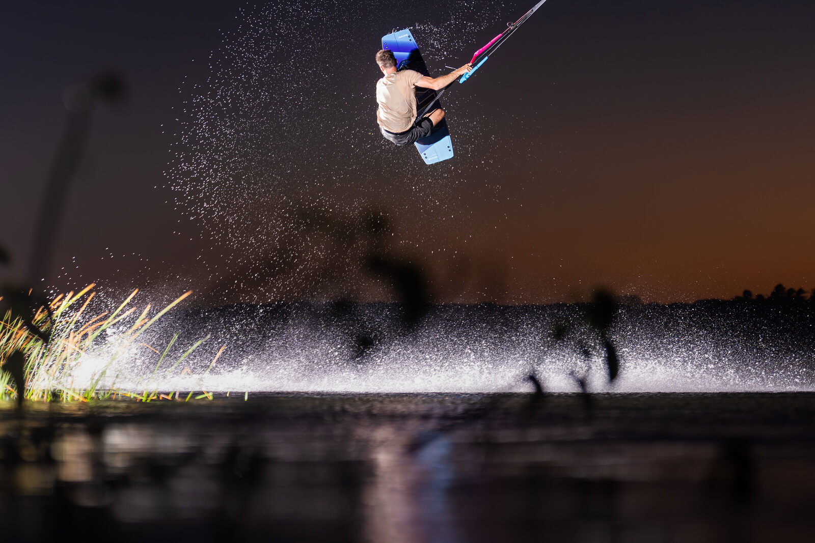 Aaron Hadlow with kite gear on the beach