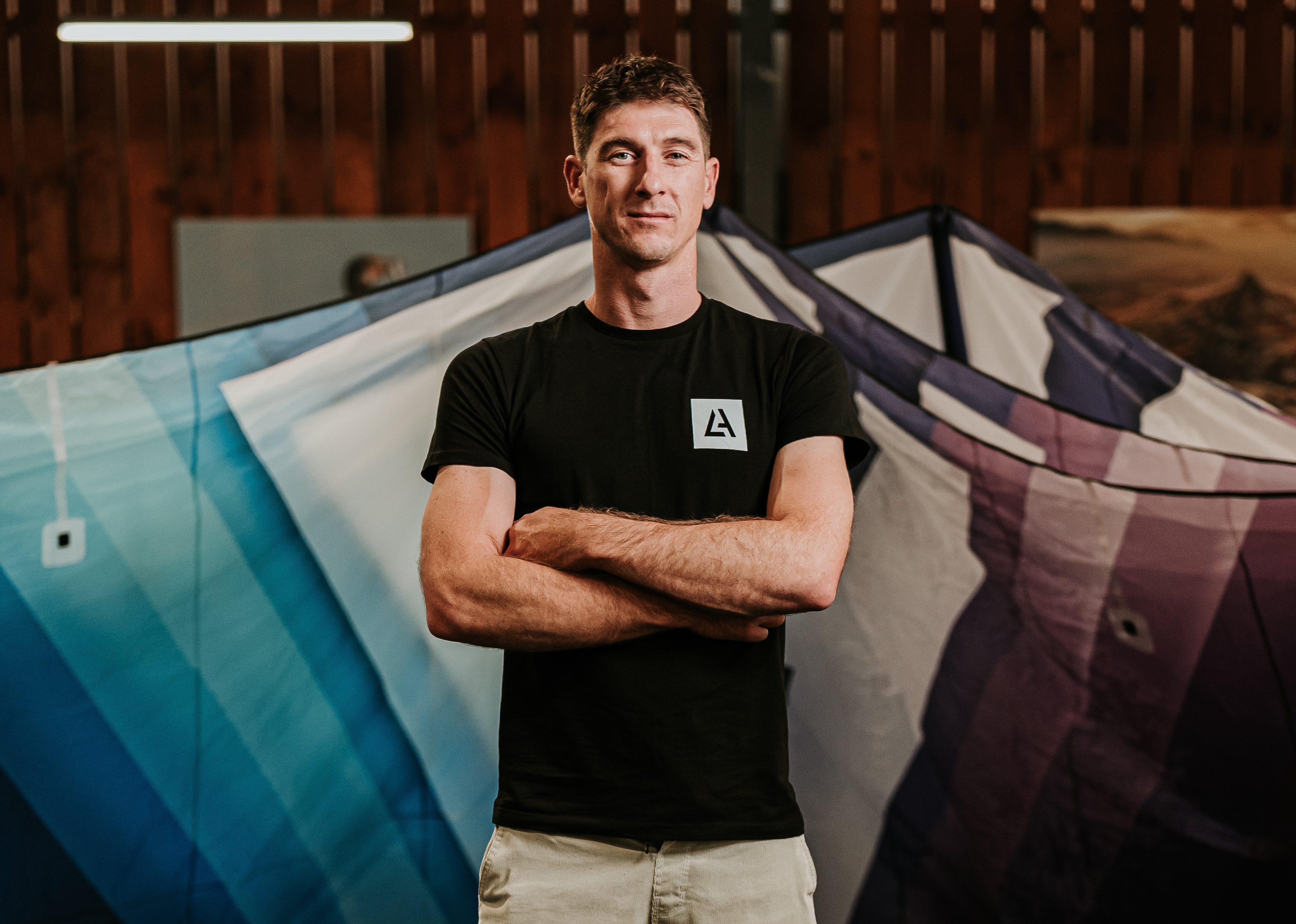 Portrait of Aaron Hadlow with kites