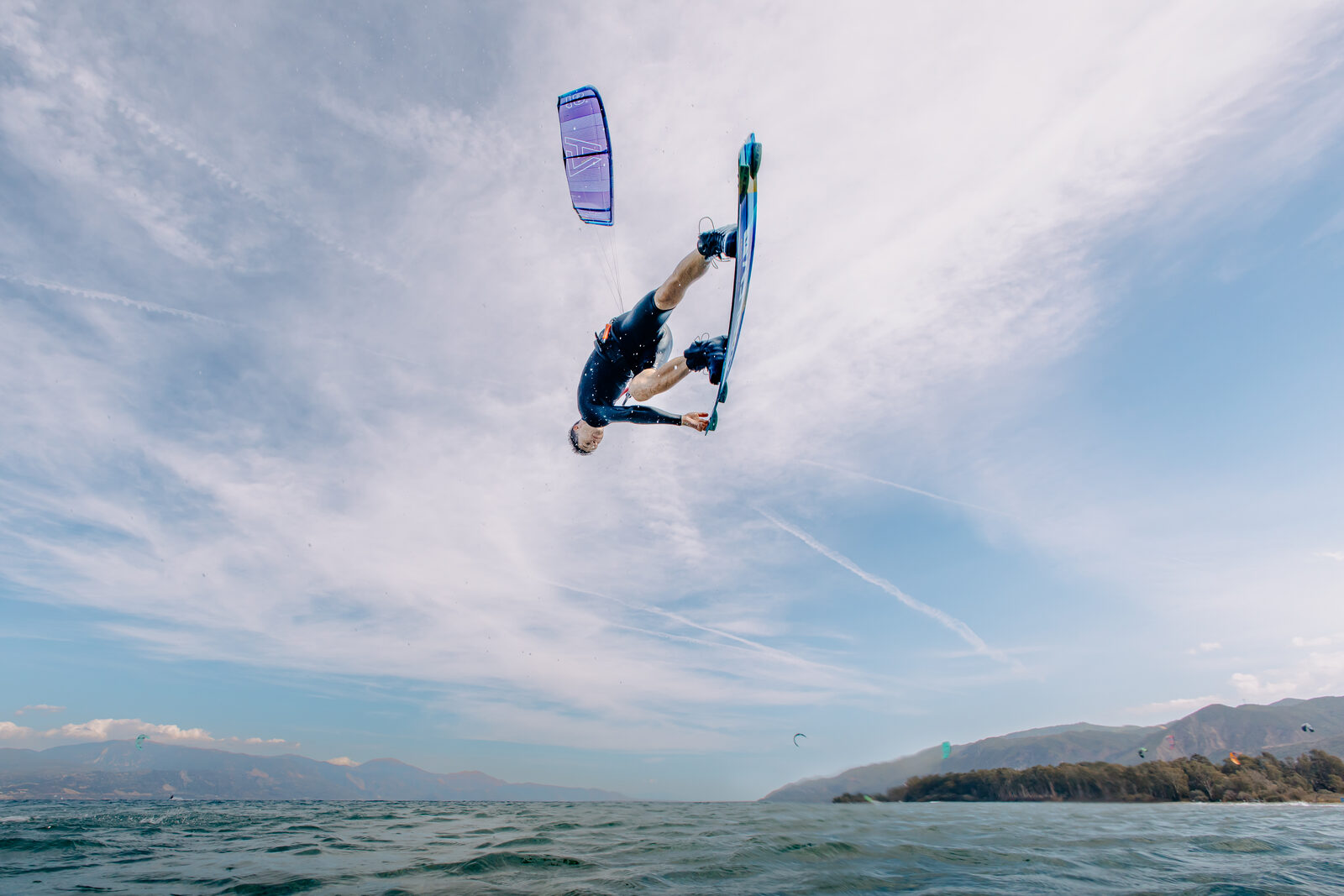 Aaron Hadlow board-off with mountain backdrop